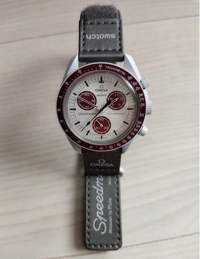 http://www.mackharry.com/~weblog/omega_swatch_pluto.jpg